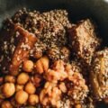 Delicious vegan bowl featuring tofu, chickpeas, and sesame seeds for a nutritious meal.